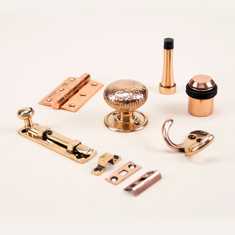 Image showing a selection of Ironmongery and Hardware in Polished Bronze.  Available to order from Trade Door Handles in Kendal