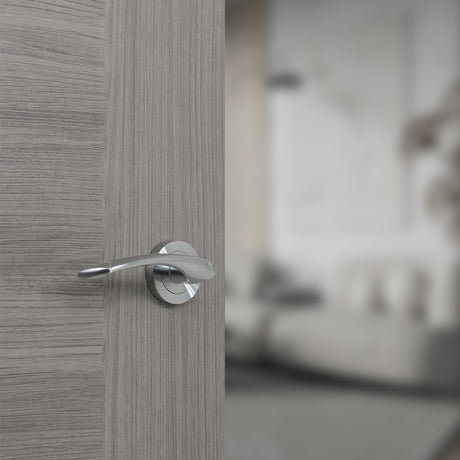 Quality image of STATUS Arizona Lever Door Handle on Round Rose - Satin Chrome | Sku. s22rsc | available from Trade Door Handles.