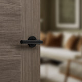 Quality image of STATUS Nebraska Lever Door Handle on Round Rose - Matt Black | Sku. s28rmb | available from Trade Door Handles.