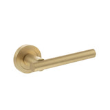 Quality image of STATUS Nebraska Lever Door Handle on Round Rose - Satin Brass | Sku. s28rsb | available from Trade Door Handles.