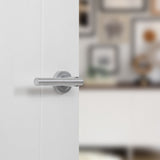 Quality image of STATUS Nebraska Lever Door Handle on Round Rose - Satin Chrome | Sku. s28rsc | available from Trade Door Handles.