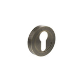 Quality image of STATUS Euro Escutcheons on Round Rose - Antique Brass | Sku. s2escerab | available from Trade Door Handles.