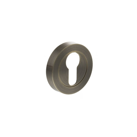 Quality image of STATUS Euro Escutcheons on Round Rose - Antique Brass | Sku. s2escerab | available from Trade Door Handles.