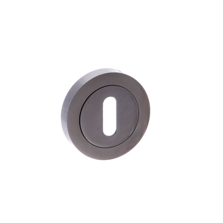 Quality image of STATUS Key Escutcheons on Round Rose - Black Nickel | Sku. s2esckrbn | available from Trade Door Handles.