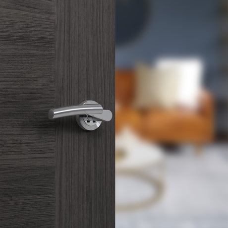 Quality image of STATUS Florida Lever Door Handle on Round Rose - Satin Chrome/Polished Chrome | Sku. s32rscpc | available from Trade Door Handles.