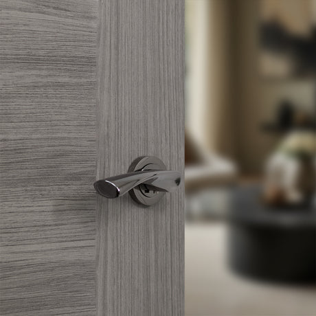 Quality image of STATUS Colorado Lever Door Handle on Round Rose - Black Nickel | Sku. s34rbn | available from Trade Door Handles.