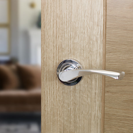 Quality image of STATUS Colorado Lever Door Handle on Round Rose - Polished Chrome | Sku. s34rpc | available from Trade Door Handles.