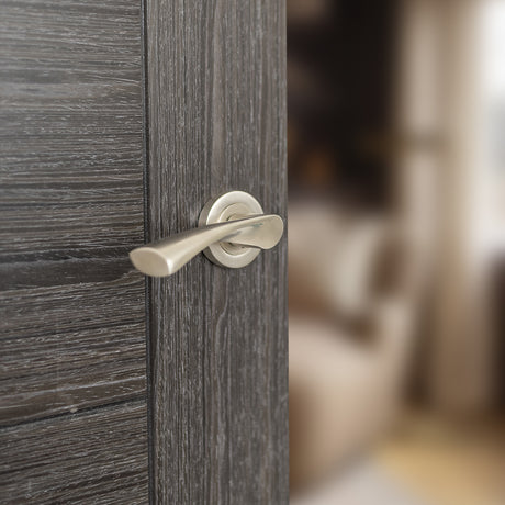 Quality image of STATUS Colorado Lever Door Handle on Round Rose - Satin Nickel | Sku. s34rsn | available from Trade Door Handles.