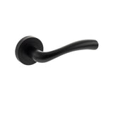 Quality image of STATUS Texas Lever Door Handle on Round Rose - Matt Black | Sku. s35rmb | available from Trade Door Handles.