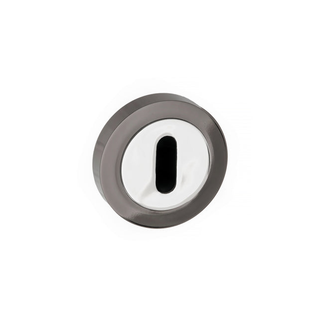Quality image of STATUS Key Escutcheons on Round Rose - Black Nickel/Polished Chrome | Sku. s3esckrbnpc | available from Trade Door Handles.