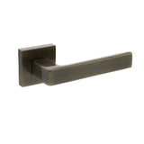 Quality image of STATUS Montana Lever Door Handle on S4 Square Rose - Antique Brass | Sku. s40sab | available from Trade Door Handles.