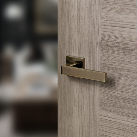 Quality image of STATUS Montana Lever Door Handle on S4 Square Rose - Antique Brass | Sku. s40sab | available from Trade Door Handles.