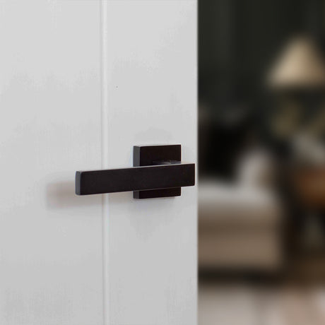 Quality image of STATUS Montana Lever Door Handle on S4 Square Rose - Matt Black | Sku. s40smb | available from Trade Door Handles.