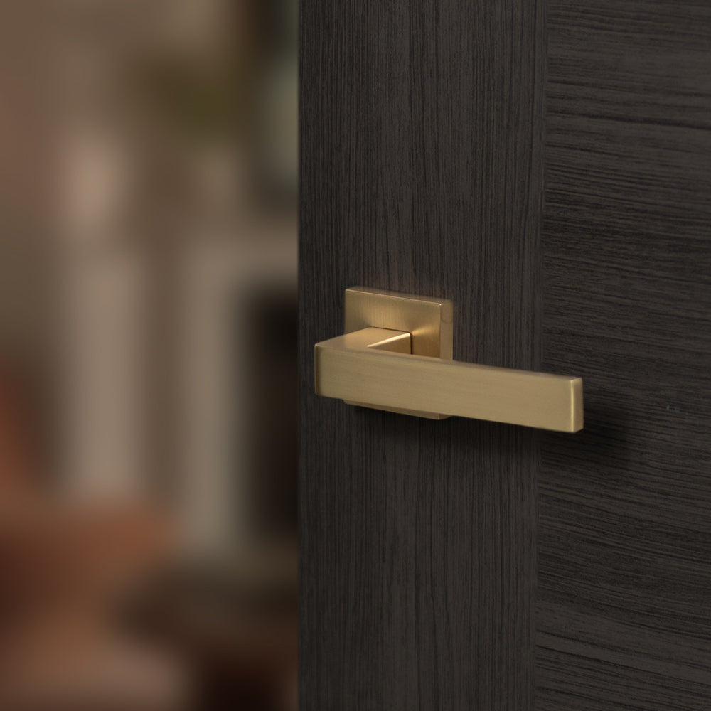Quality image of STATUS Montana Lever Door Handle on S4 Square Rose - Satin Brass | Sku. s40ssb | available from Trade Door Handles.