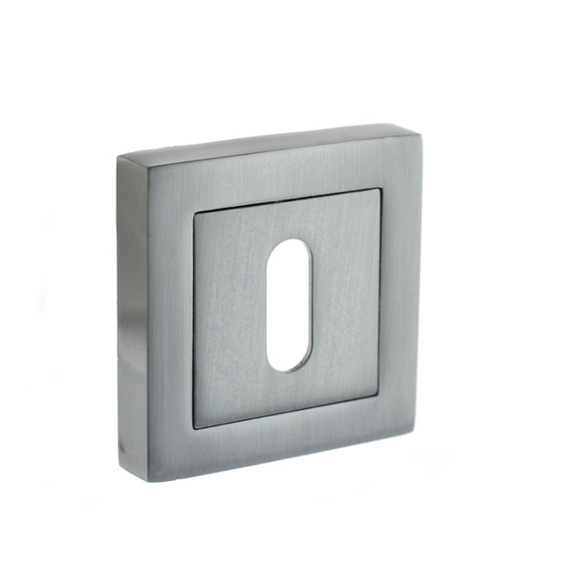 Quality image of STATUS Key Escutcheons on S4 Square Rose - Satin Chrome | Sku. s4esckssc | available from Trade Door Handles.