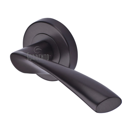 High quality image of the Sorrento Door Handle Lever Latch on Round Rose Treviso Design Matt Bronze on Zinc finish | Sku. SC-2042-MBZ | available to order from Trade Door Handles.