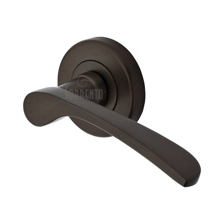 High quality image of the Sorrento Door Handle Lever Latch on Round Rose Arcadia Design Matt Bronze on Zinc finish | Sku. SC-5380-MBZ | available to order from Trade Door Handles.