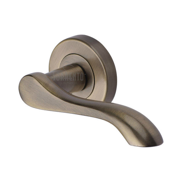 High quality image of the Sorrento Door Handle Lever Latch on Round Rose Aurora Design Antique on Zinc finish | Sku. SC-7352-AZ | available to order from Trade Door Handles.
