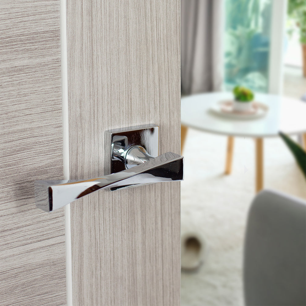 Quality image of Senza Pari Guido Lever Door Handle on Flush Square Rose - Polished Chrome | Sku. sp190cp | available from Trade Door Handles.