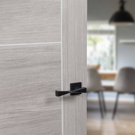 Quality image of Senza Pari Guido Lever Door Handle on Flush Square Rose - Matt Black | Sku. sp190mb | available from Trade Door Handles.