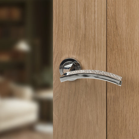 Quality image of Senza Pari Crystal Lever Door Handle on Round Rose - Polished Chrome | Sku. spm167crcp | available from Trade Door Handles.