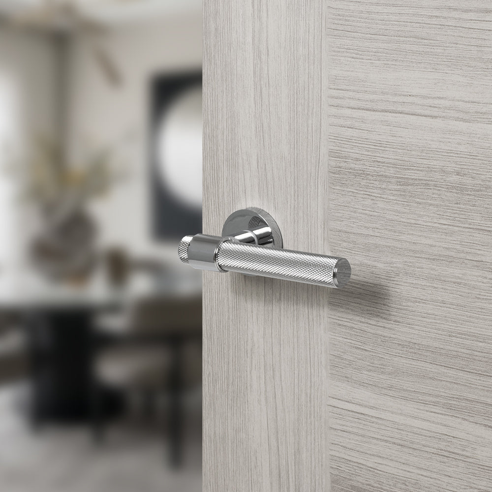 Quality image of Senza Pari Andretta Knurled Lever Door Handle on Minimal Round Rose - Polished Chrome | Sku. spr160pc | available from Trade Door Handles.