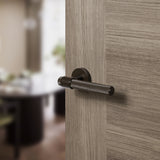 Quality image of Senza Pari Andretta Knurled Lever Door Handle on Minimal Round Rose - Urban Dark Bronze | Sku. spr160udb | available from Trade Door Handles.