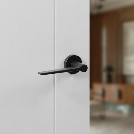 Quality image of Senza Pari Laviano Lever Door Handle on Minimal Round Rose - Matt Black | Sku. spr180mb | available from Trade Door Handles.