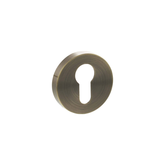 Quality image of Senza Pari Euro Escutcheons on Minimal Round Rose - Antique Brass | Sku. spresceab | available from Trade Door Handles.