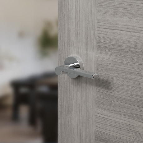 Quality image of Senza Pari Darrio Lever Door Handle on Round Rose - Polished Chrome | Sku. spro218pc | available from Trade Door Handles.