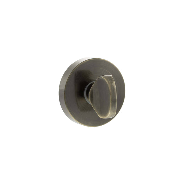 Quality image of Senza Pari WC Turn and Release on Minimal Round Rose - Antique Brass | Sku. sprwcab | available from Trade Door Handles.