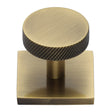 High quality image of Heritage Brass - Cabinet Knob Disc Knurled Design with Square Backplate 32mm Ant | Sku. sq3884-at | Trade Door Handles, Kendal.