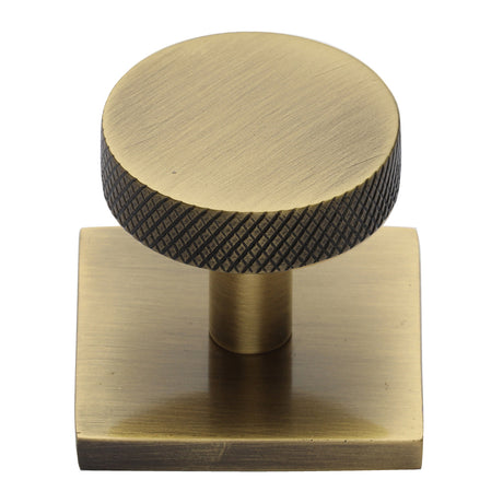 High quality image of Heritage Brass - Cabinet Knob Disc Knurled Design with Square Backplate 32mm Ant | Sku. sq3884-at | Trade Door Handles, Kendal.