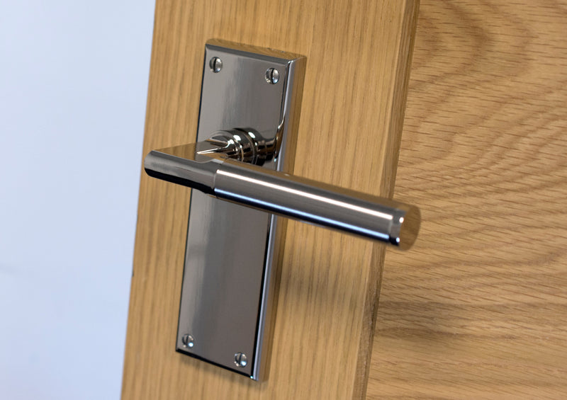 This is an image showing Serozzetta sessanta lever on backplate in a silver finish