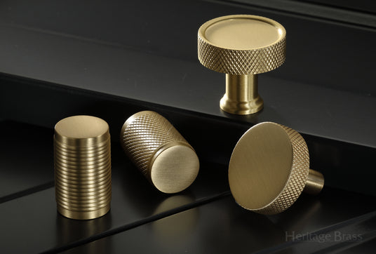 This image shows a range of cabinet knobs by Heritage Brass in a Satin Brass finish.  Available to order from Trade Door Handles in Kendal