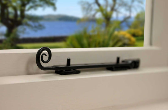 Image showing a monkey tail casement stay made by Stonebridge.  Available to order from Trade Door Handles