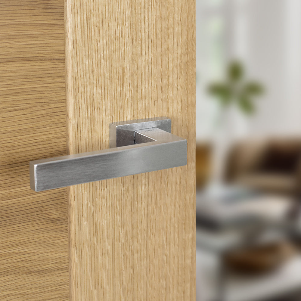 Quality image of Tupai Rapido RetaLine Rillo Lever Door Handle on Long Rose - Satin Chrome | Sku. t2275lsc | available from Trade Door Handles.