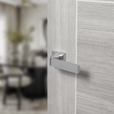 Quality image of Tupai Rapido CurvaLine Turis Lever Door Handle on Square Rose - Satin Chrome | Sku. t2732ssc | available from Trade Door Handles.