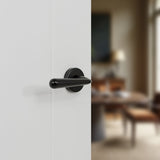 Quality image of Tupai Rapido CurvaLine Adra Lever Door Handle on Round Rose - Pearl Black | Sku. t293rmb | available from Trade Door Handles.