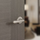 Quality image of Tupai Rapido CurvaLine Adra Lever Door Handle on Round Rose - Pearl Nickel | Sku. t293rpl | available from Trade Door Handles.