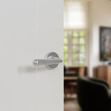 Quality image of Tupai Rapido CurvaLine Adra Lever Door Handle on Round Rose - Satin Chrome | Sku. t293rsc | available from Trade Door Handles.