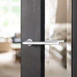 Quality image of Tupai Rapido RetaLine Tavira Lever Door Handle on Concealed Round Rose - Bright Polished Chrome | Sku. t3098crpc | available from Trade Door Handles.