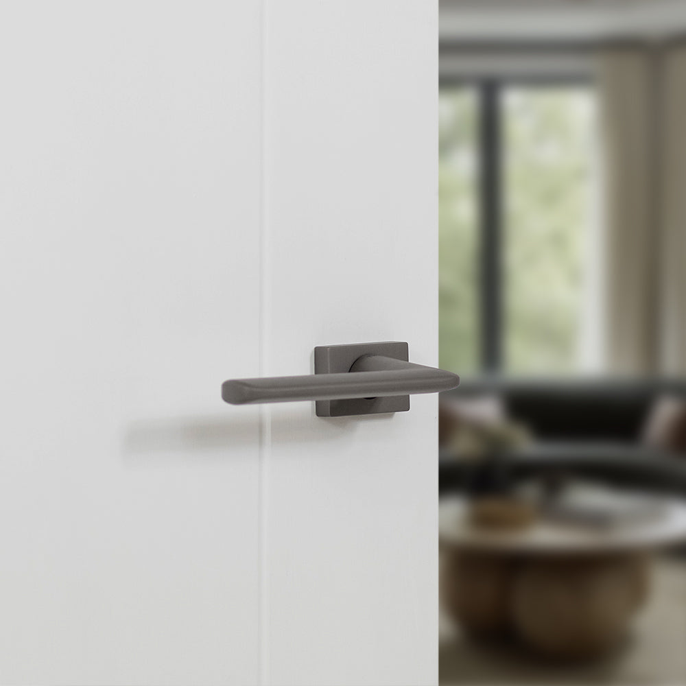 Quality image of Tupai Rapido RetaLine Tavira Lever Door Handle on Long Rose - (Without Decorative Plate) - Titanium | Sku. t3098ltt | available from Trade Door Handles.