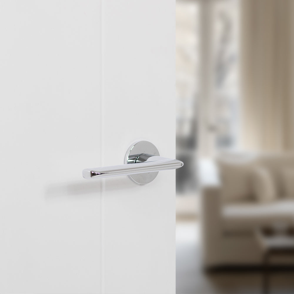 Quality image of Tupai Rapido 5S Line Tavira Lever Door Handle on 5mm Slimline Round Rose - Bright Polished Chrome | Sku. t3098r5spc | available from Trade Door Handles.