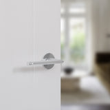 Quality image of Tupai Rapido 5S Line Tavira Lever Door Handle on 5mm Slimline Round Rose - Satin Chrome | Sku. t3098r5ssc | available from Trade Door Handles.