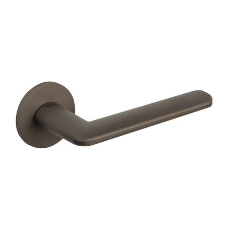 Quality image of Tupai Rapido 5S Line Tavira Lever Door Handle on 5mm Slimline Round Rose - Titanium | Sku. t3098r5stt | available from Trade Door Handles.