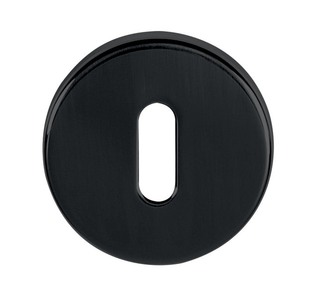 Quality image of Tupai Rapido CurvaLine Key Escutcheons on Round Rose - Pearl Black | Sku. tesckrmb | available from Trade Door Handles.