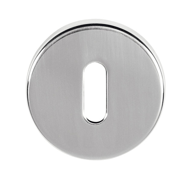 Quality image of Tupai Rapido CurvaLine Key Escutcheons on Round Rose - Satin Chrome | Sku. tesckrsc | available from Trade Door Handles.