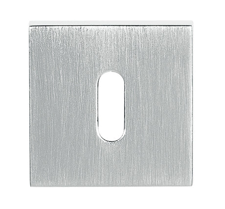 Quality image of Tupai Rapido Curva/QuadraLine Key Escutcheons on Square Rose - Satin Chrome | Sku. tesckssc | available from Trade Door Handles.