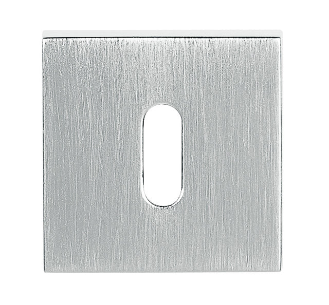 Quality image of Tupai Rapido Curva/QuadraLine Key Escutcheons on Square Rose - Satin Chrome | Sku. tesckssc | available from Trade Door Handles.